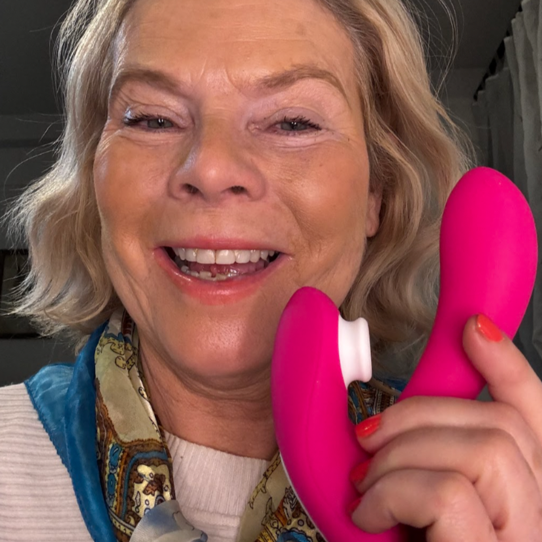 Purple silicone Donna Sonic clitoral stimulator and vibrating dildo with remote control and 9-speed settings