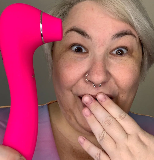 Pink air pulse vibrator from VIVA, featuring ergonomic design for dual stimulation in an adult toy trio set.