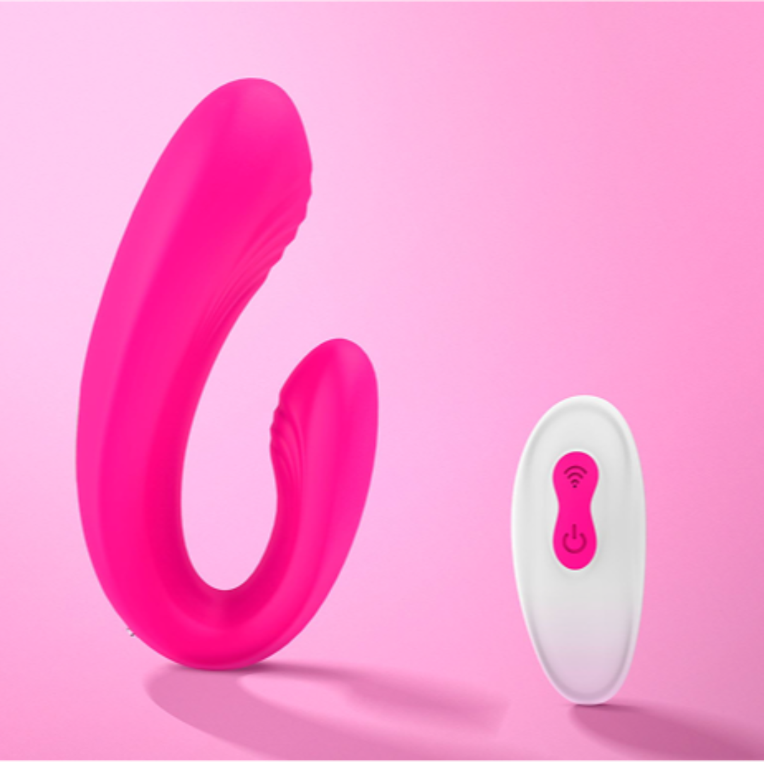 Pink clitoral stimulator with wireless remote in a 4-piece couples intimacy set by VIVA.